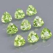 Fantastic 4.32ct 5x5mm trillion cut Peridot set