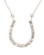 14kt White gold 0.75ctw diamond horse shoe pendant on chain