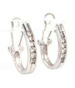 14kt White gold 0.50ctw round brilliant cut diamond J hoop earrings