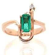18kt Yellow gold Emerald cut and diamond fancy ring