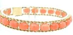 14kt Yellow gold oval coral link bracelet with rope trim