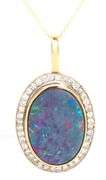 16kt Yellow gold large oval opal and diamond pendant on chain