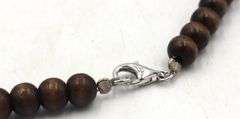 Wooden beads necklace with silver clasp