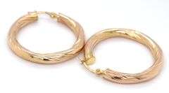 14kt Yellow gold twisted hoop earrings