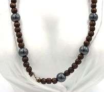 Wooden beads necklace with silver clasp