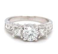 14kt White gold 0.90ct round brilliant cut with 1ctw RBC and PC side