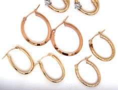 4 Pairs of 14kt yellow gold hoop earrings
