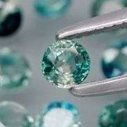 Heated only! 4.38ct blue green Sapphire set