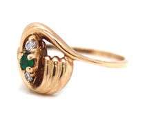 14kt Yellow gold emerald and diamond bypass ring