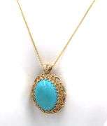 14kt Yellow gold large turquoise and diamond accent pendant on chain