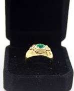 18kt Yellow gold apx 0.45ct Oval Emerald & Diamond Accent Ring
