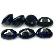 Heavy 14.02ct midnight blue Sapphire set