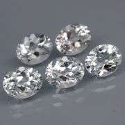 5 high fire diamond white Topaz weighing 3 carats each!