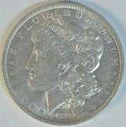 Creamy-white scarce 1891-O Morgan Silver Dollar. AU58+