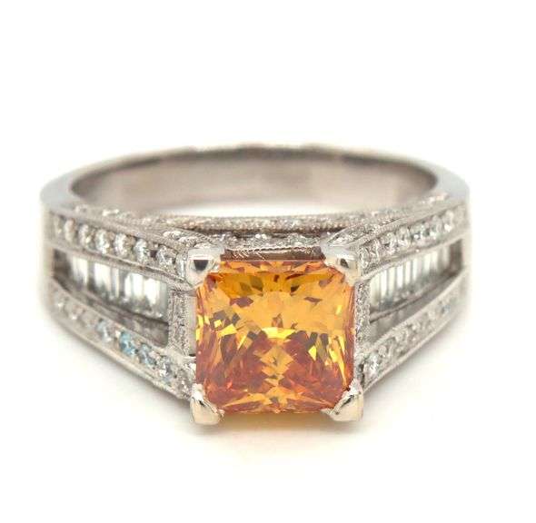 14kt White gold Yellow orange diamond in 1.75ctw white diamond setting