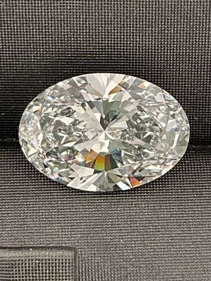 I.G.I CERTIFIED 7.05 CARAT OVAL SHAPED DIAMOND.