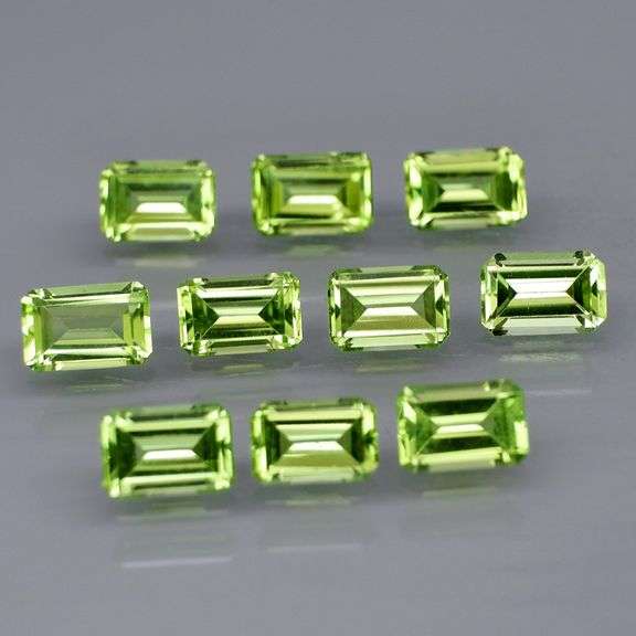 Brilliant 6.35ct 10pc set of matched emerald cut Peridot