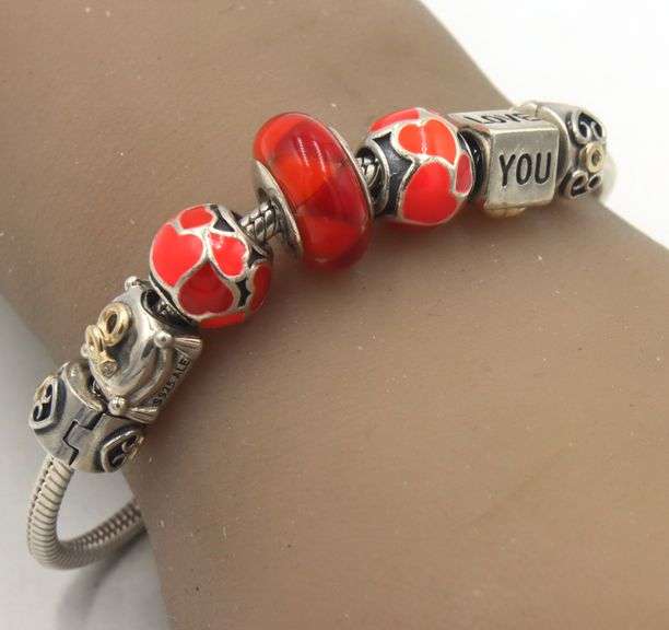 925 Sterling silver Pandora bracelet with 7 charms