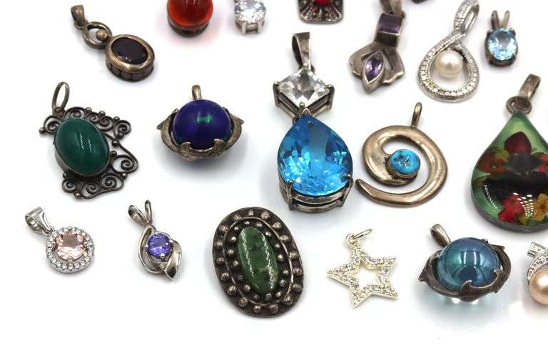 Lot of vintage 925 sterling silver pendants and charms