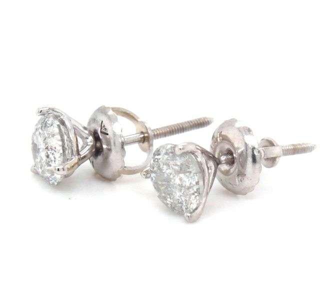 One pair of 14kt white gold 0.81ctw round brilliant cut diamond stud earrings