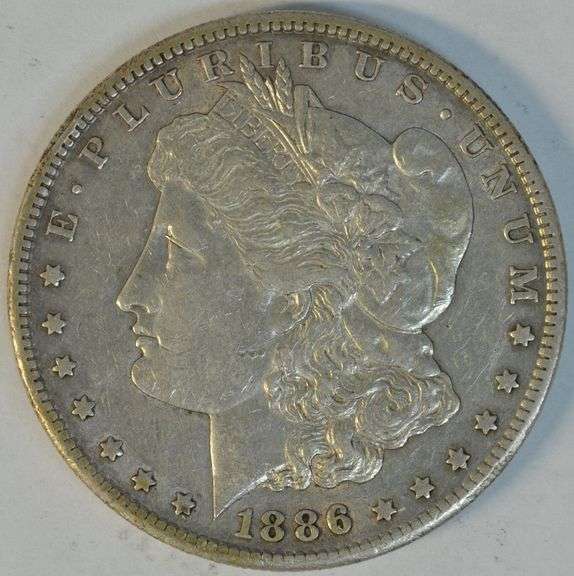 High grade scarce date 1886-S Morgan Silver Dollar in AU