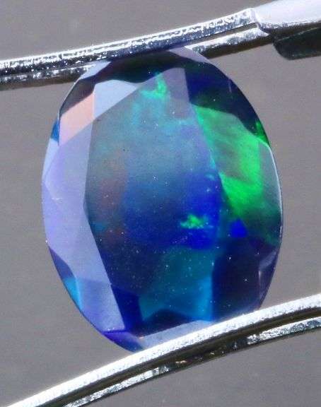 Floral patterned 1.32ct faceted Black Opal