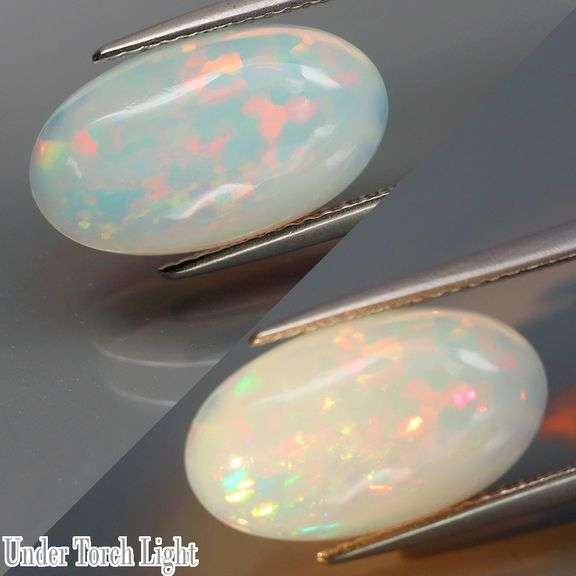 Snow white and filled with color! 3.63ct untreated opal!!!