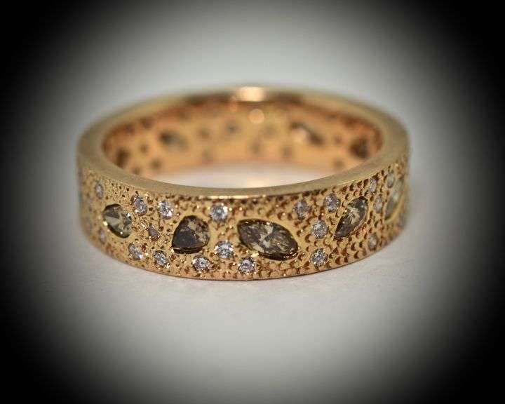 Unique 18K Rose Gold Band with Numerous Diamonds