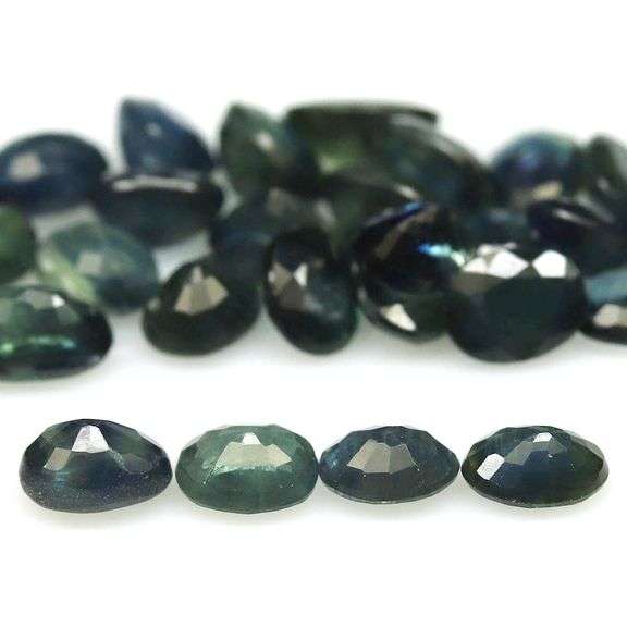 Heated only! 7.90ct blue green Sapphire set