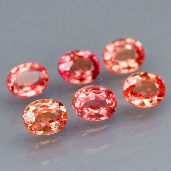Dynamic 2.92ct Padparadscha Sapphire set