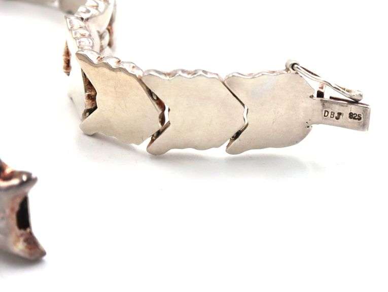 925 Sterling silver signed bow link bracelet