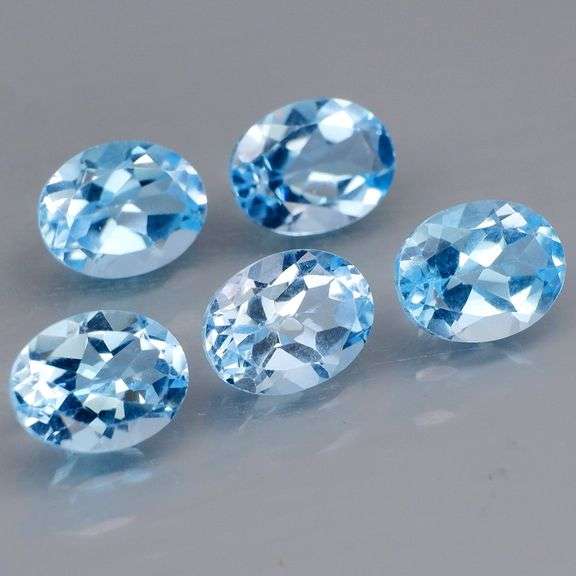 Sparkling! 11.14ct vibrant Swiss blue Topaz set