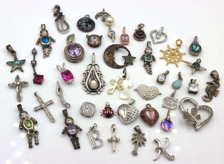 Lot of vintage 925 sterling silver pendants and charms