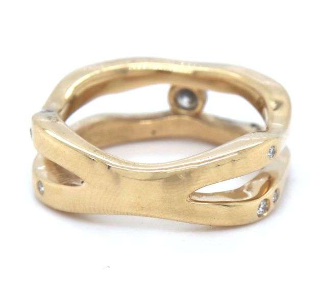 14kt Yellow gold 0.25ctw channel and Burnished set band