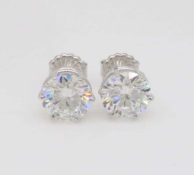 Certified 6.04CTW Diamond Stud Earrings in 14k White Gold