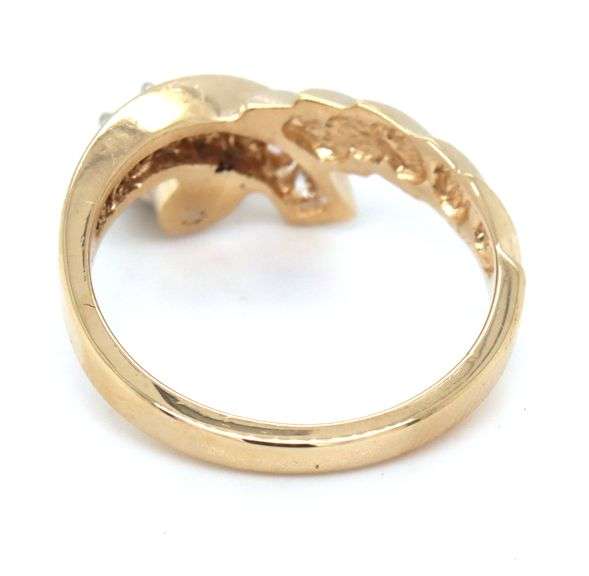 14kt Yellow gold 0.50ctw channel set twisted shank engagement ring