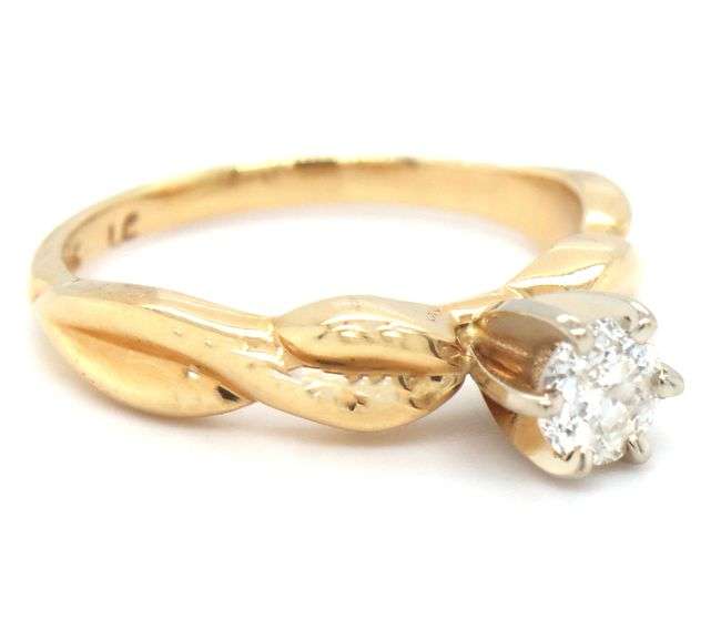 14kt Yellow gold round brilliant cut diamond ring