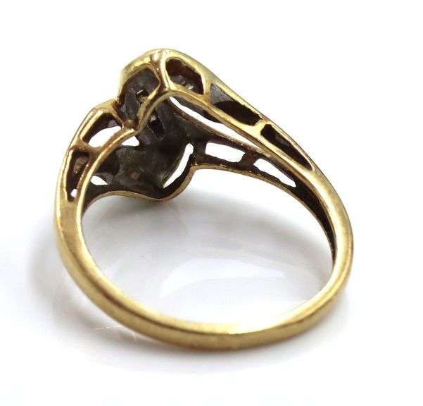 10kt Yellow gold diamond cross over ring