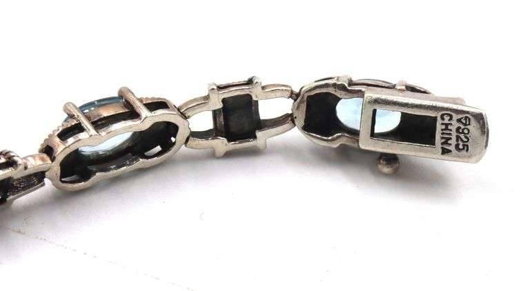 Vintage 925 sterling silver signed blue topaz link bracelet