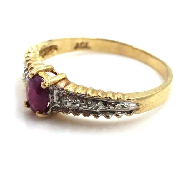 10kt Yellow gold ruby and diamond cocktail ring