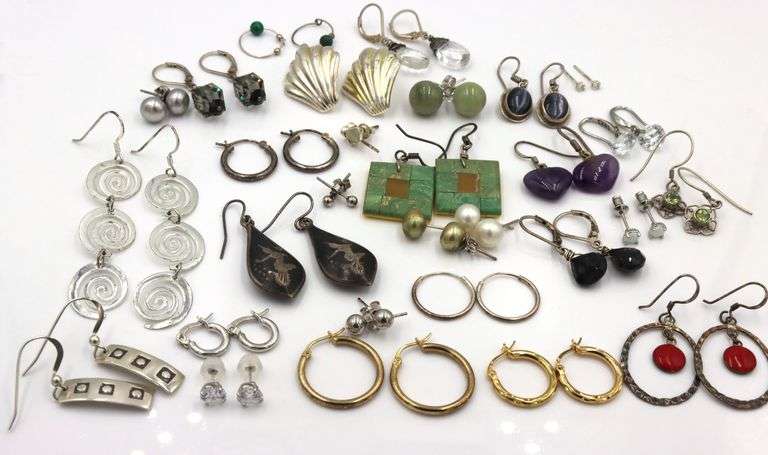 Group lot of vintage 925 sterling silver stud and dangle earrings