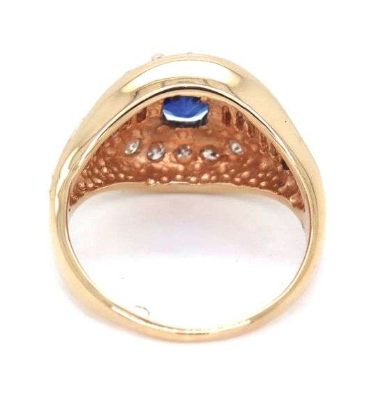 14kt Yellow gold 0.75ct sapphire with 0.50ctw diamond ring