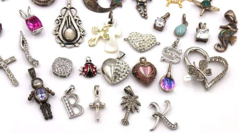 Lot of vintage 925 sterling silver pendants and charms