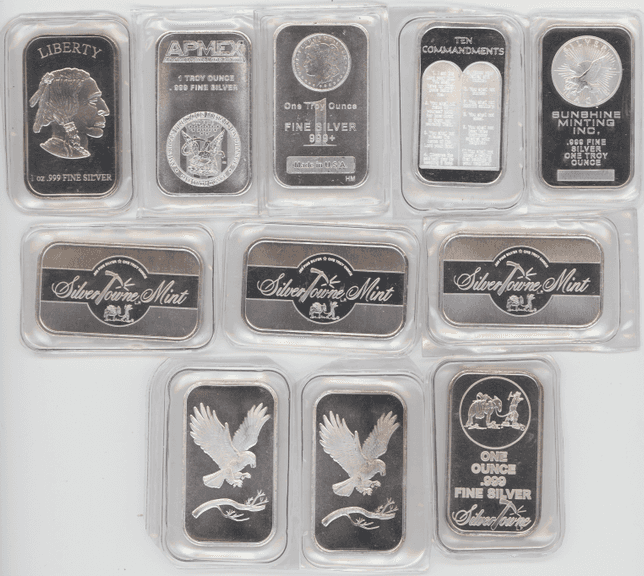 Ten attractive assorted 1 Troy Oz pure .999 fine silver bars in plastic