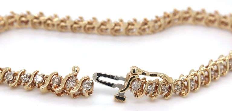14kt Yellow gold 1.50ctw diamond S tennis bracelet