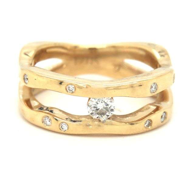 14kt Yellow gold 0.25ctw channel and Burnished set band