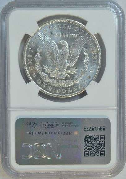 Prooflike surfaces on the near Gem BU 1904-O Morgan Silver Dollar