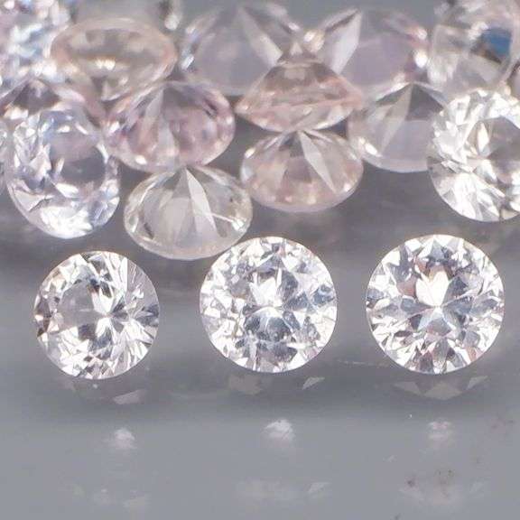 Heated only! 2.12ct diamond white Sapphire set
