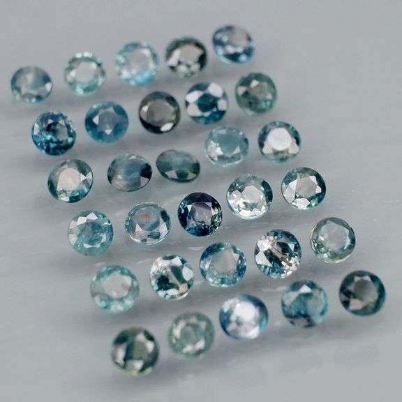 Heated only! 4.52ct blue green Sapphire set