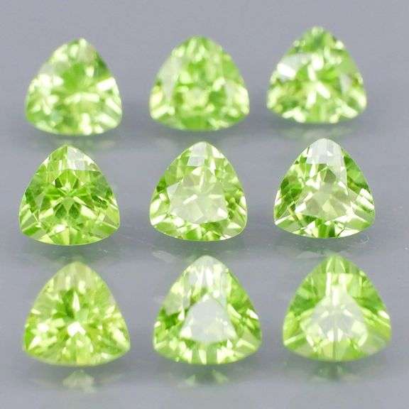 Fantastic 4.45ct 5x5mm trillion cut Peridot set